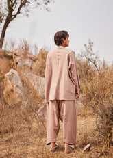 A Model Wearing White Cotton Mul Dune Shirt,curated by Only Ethikal